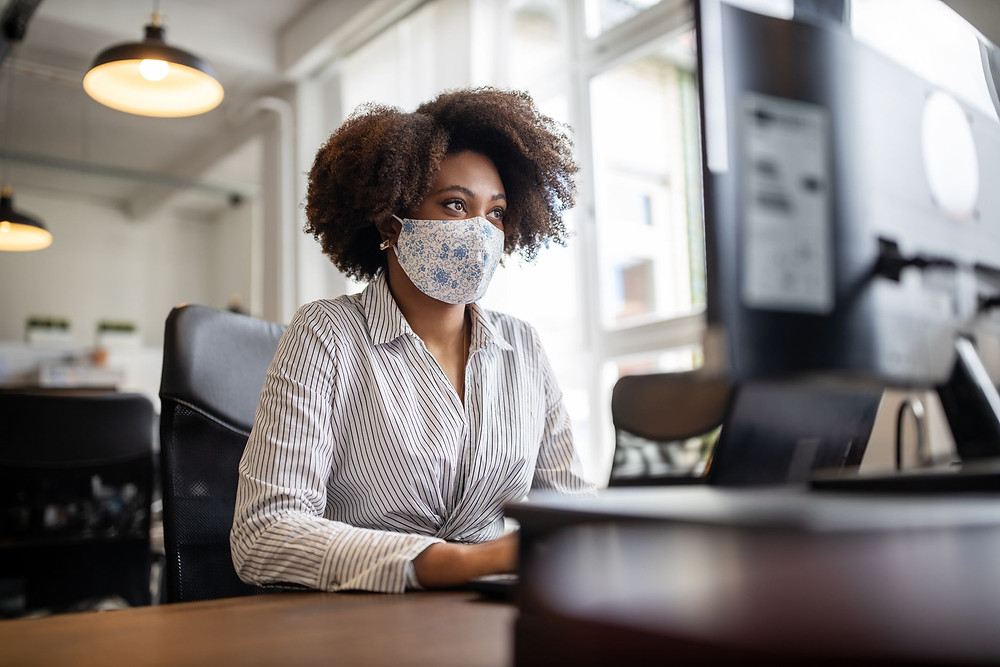 Employees with facemasks Employees with facemasks during the pandemic